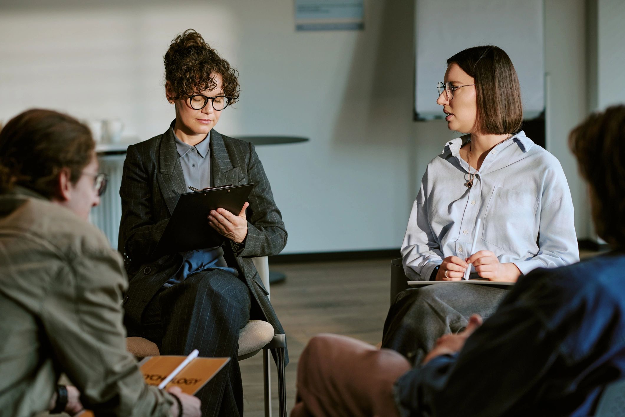 Community members gathered in a discussion session